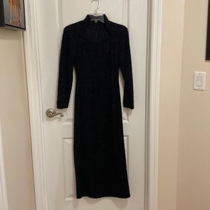 Beautiful evening dress with slit in the back.